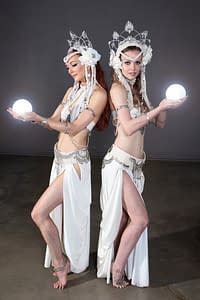 Two beautiful belly dancers holding LED orbs - FemPyre Fire Art