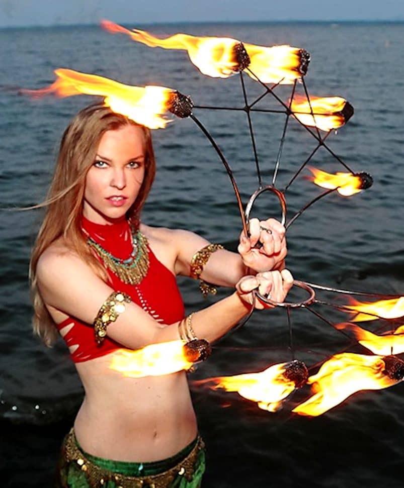 Brianna Apsara fire fans by water